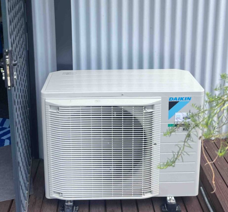 Outdoor unit featured in a Daikin air conditioning installation.