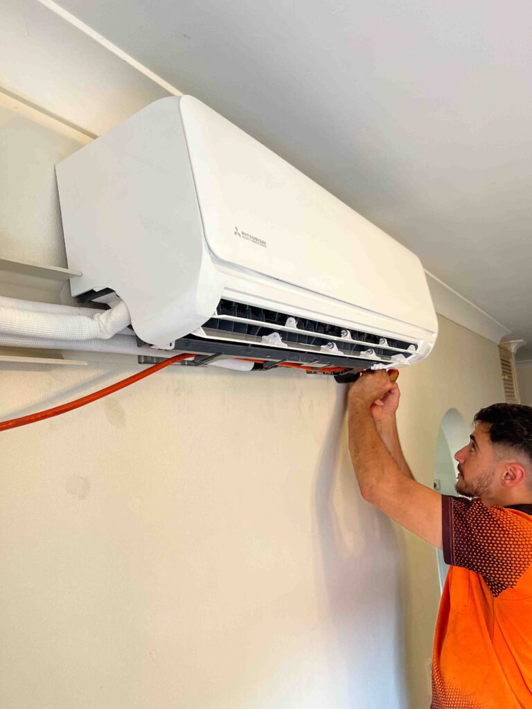 Our team completing a split system installation Sydney.