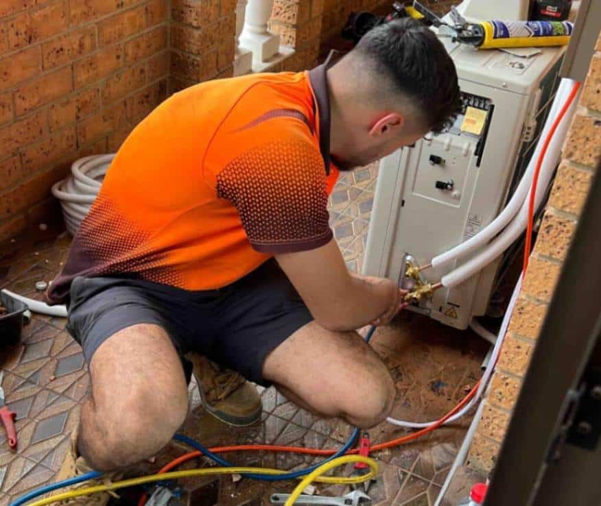 Our expert team installing an air conditioning system for a residential project.