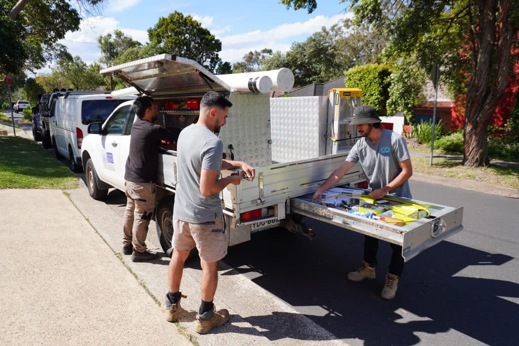 correct connect team getting tools out of the van