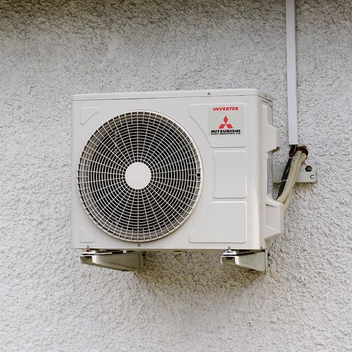 The exterior of a Mitsubishi air conditioning system