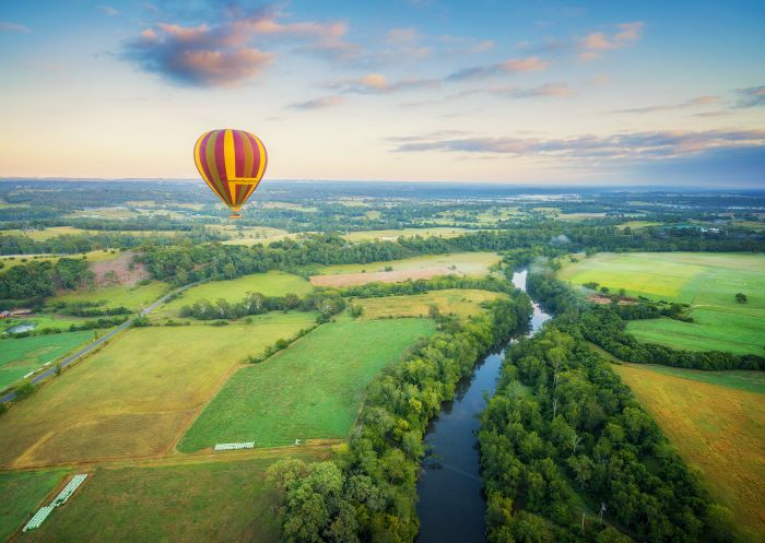 A hot air ballon floating above south west sydney